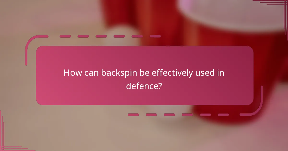 How can backspin be effectively used in defence?